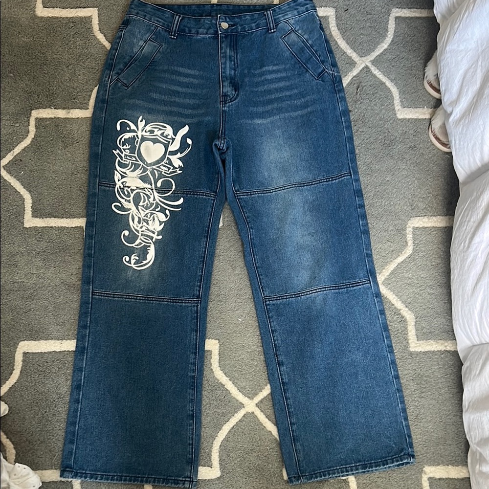 SHEIN Blue Flare & Wide Leg Jeans with White Floral Design